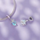 NÆRBILD AV JBX CHARM SWEET NATURE SILVER PÅ ET ARMBÅND OG ALENE thumbnail