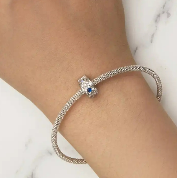 JBX CHARM STJERNESTØV SILVER CRYSTAL PÅ ARMBÅND