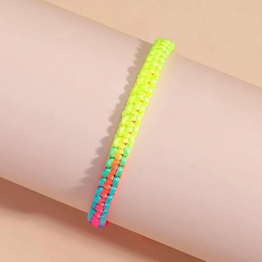 JBX MULTICOLORED BRACELET ON A MODEL'S WRIST