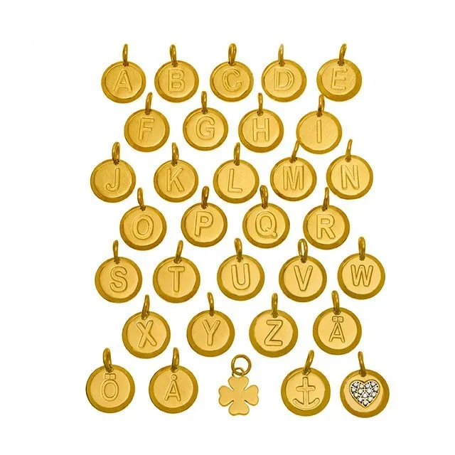 KOLLEKSJON AV MATTE GULL BOKSTAVS- OG SYMBOLANHENG FRA CHARMENTITY