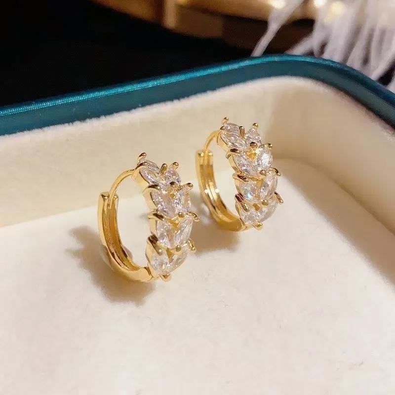 AVI Jewels London earrings gold